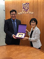 Prof. Fanny Cheung, Pro-Vice-Chancellor of CUHK (right) presents a souvenir to  Prof. Wang Shoujun, Vice President of BNU
